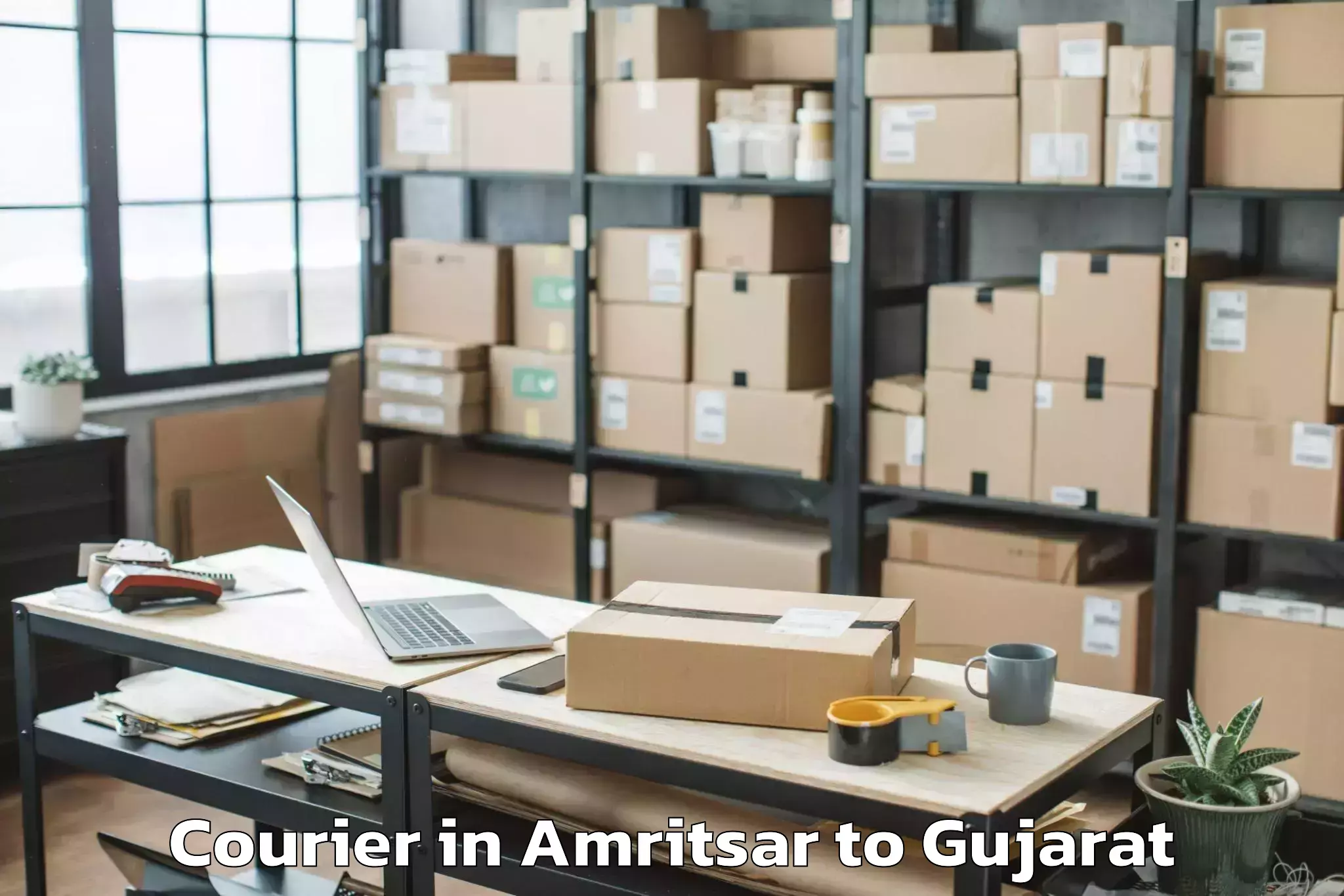 Trusted Amritsar to Jhagadia Courier